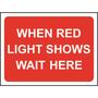 When Red Light Shows Wait Here Road Sign