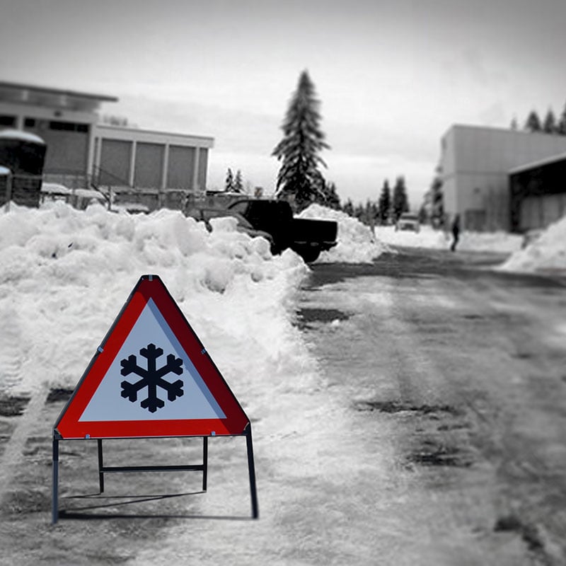 Snow and Ice road sign complete with stanchion