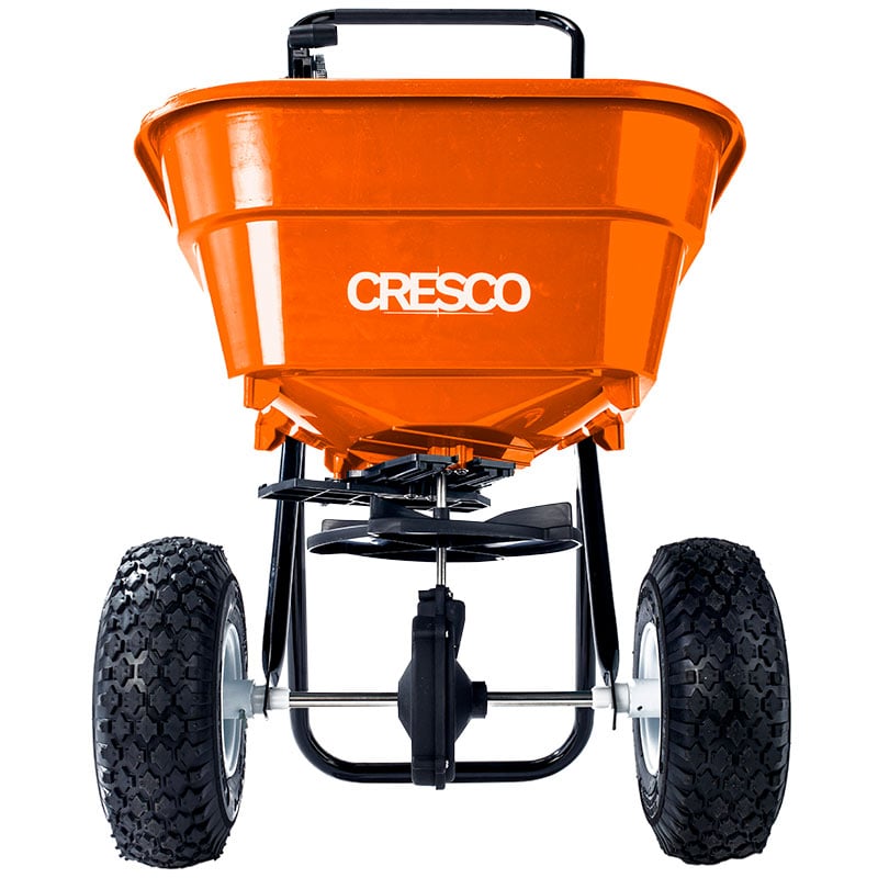 Cresco spreader with pneumatic wheels and bright orange hopper