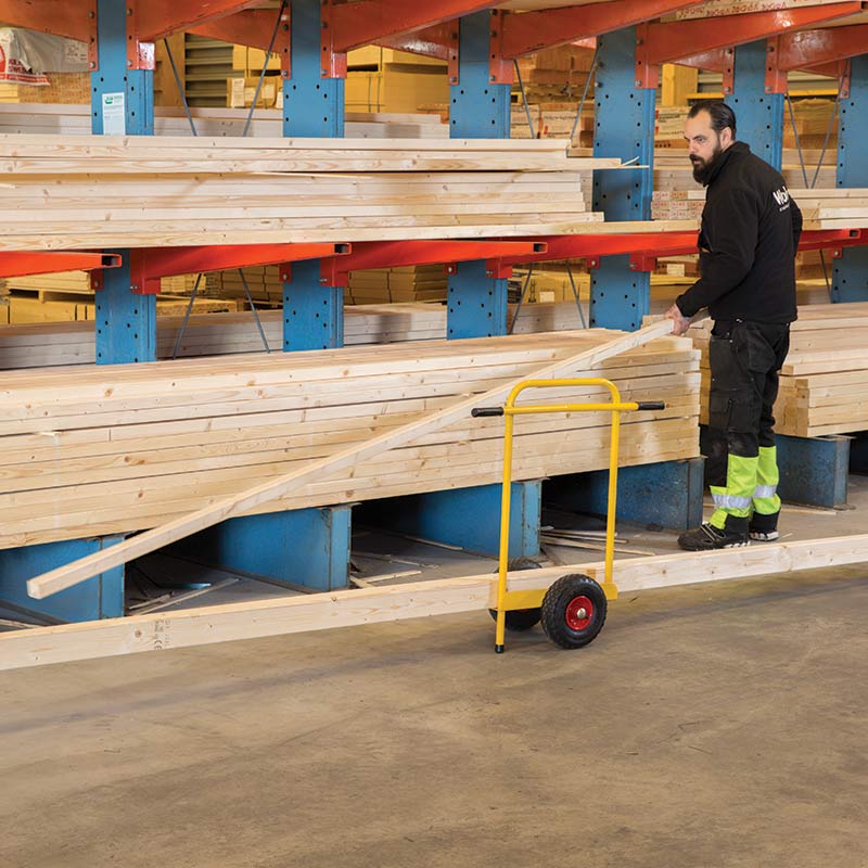 Kongamek yellow board trolley used for transporting lengthy items