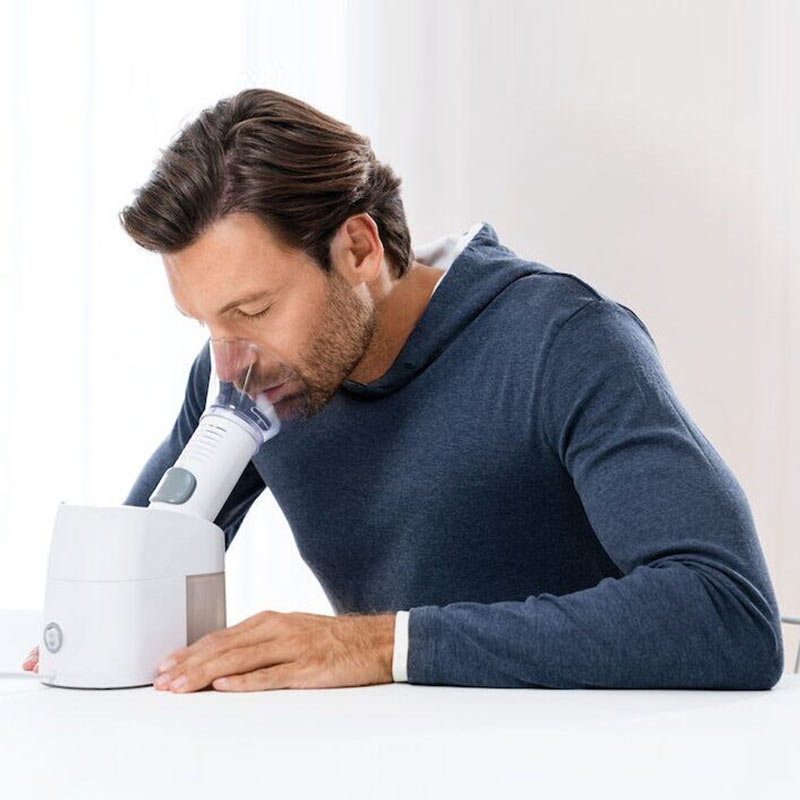 Gentleman using Beurer SI40 steam inhaler