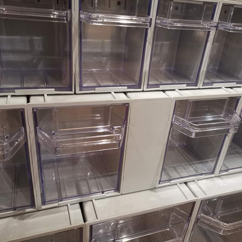 Rhino tilt storage bins with spacer