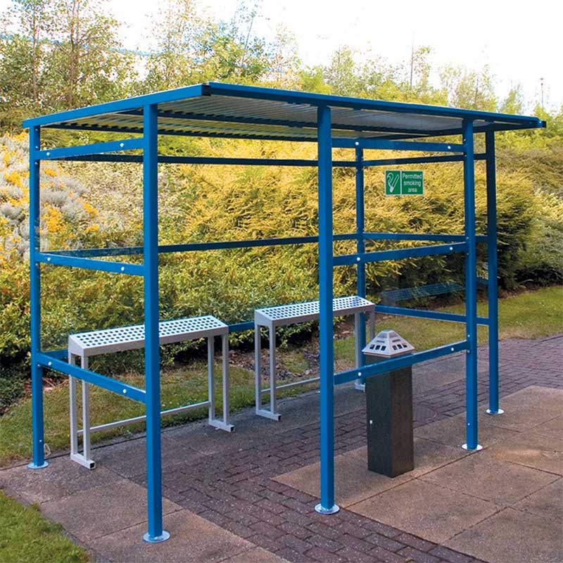 Sloping perch seats located inside bus shelter