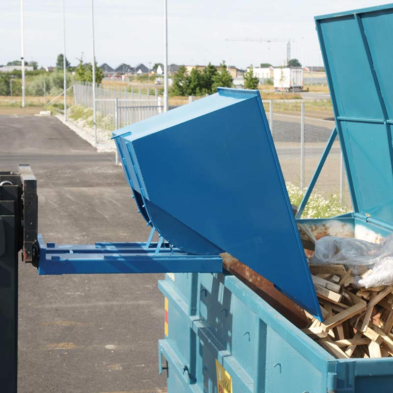Blue forklift tipping skip