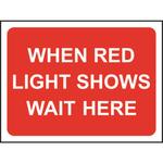 When Red Light Shows Wait Here Road Sign