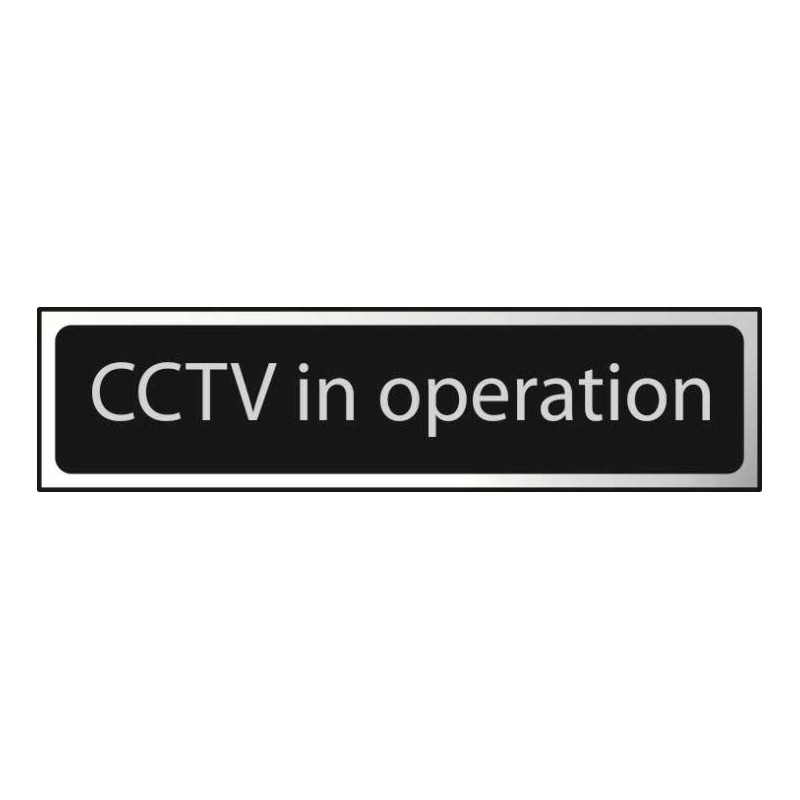 CCTV In Operation Sign - Polished Chrome & Black Effect Laminate with Self-Adhesive Backing - 50 x 200mm