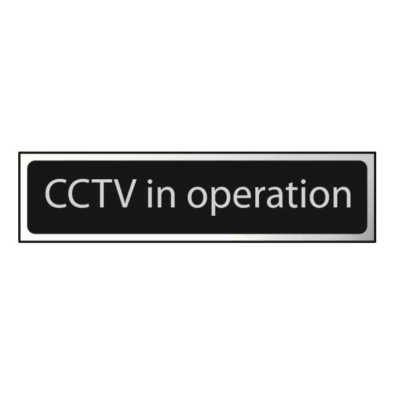 CCTV In Operation Sign - Polished Chrome & Black Effect Laminate with Self-Adhesive Backing - 50 x 200mm