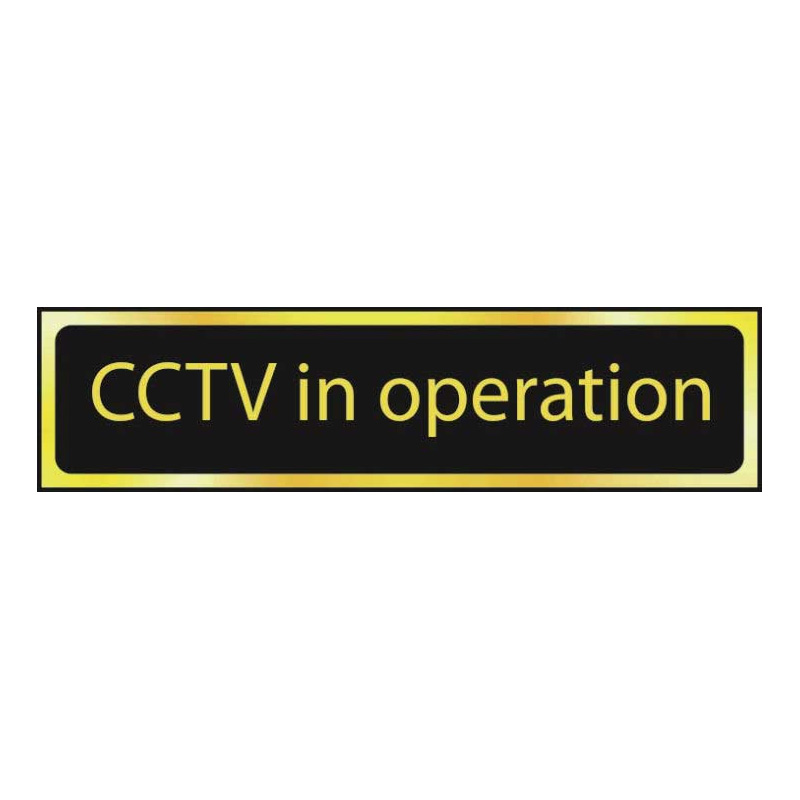 CCTV In Operation Sign - Polished Gold & Black Effect Laminate with Self-Adhesive Backing -50 x 200mm